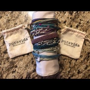 Puravida bracelets. 11 included.